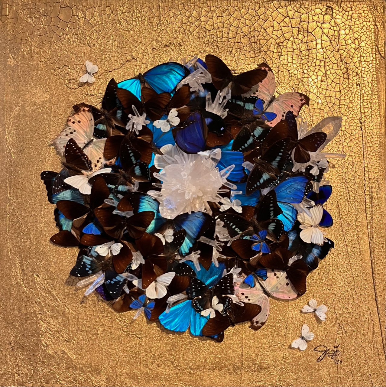 Healing: Mixed Media Nature Butterfly Art A vibrant artwork featuring a cluster of blue, black, and white butterflies against a textured gold background surrounding a clear quartz cluster.